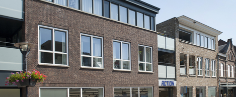 Commerciele ruimte en 6 appartementen Heythuysen